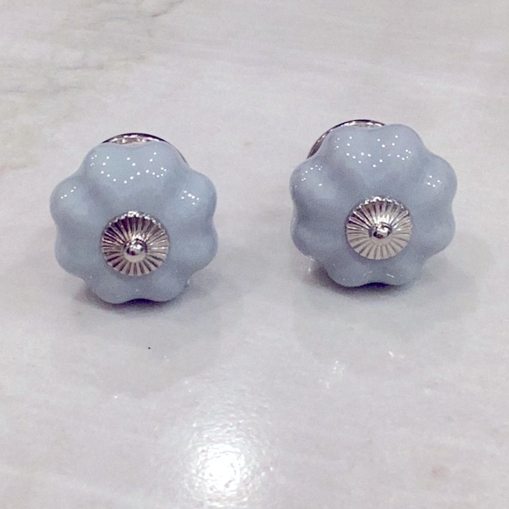 Two Anthro drawer knobs